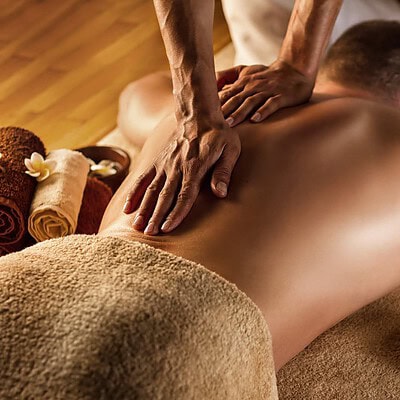 deep tissue massage bristol uk - Man has deep tissue massage on the back